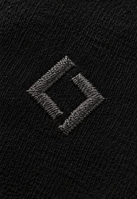 Gunmetal embroidered broken-square emblem on black jersey